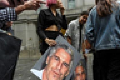 NEW YORK, NY - JULY 08: A protest group called "Hot Mess" hold up signs of Jeffrey Epstein in front of the Federal courthouse on July 8, 2019 in New York City. According to reports, Epstein will be charged with one count of sex trafficking of minors and one count of conspiracy to engage in sex trafficking of minors. (Photo by Stephanie Keith/Getty Images)