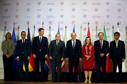 Представитель Евросоюза Федерика Могерини и главы МИД стран G7 Хайко Маас, Джереми Хант, Джон Салливан, Жан-Ив Ле Дриан, Христя Фриланд, Энцо Моаверо-Миланези и Таро Коно 