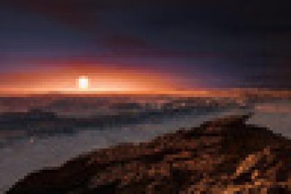 Вид с Proxima b на Проксиму Центавра (в представлении художника)
